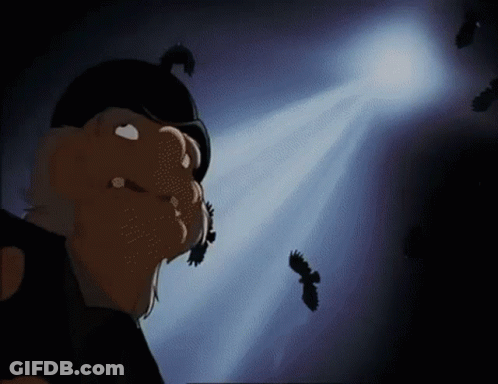 A Cartoon Character Is Standing In Front Of A Spotlight With Birds Flying Around Him GIF