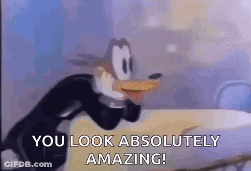 A Cartoon Character Is Standing In Front Of A Table And Says `` You Look Absolutely Amazing '' . GIF