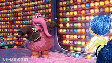 A Cartoon Character Is Standing In Front Of A Wall Of Colored Balls GIF