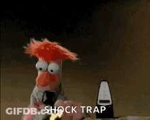 A Cartoon Character Is Standing In Front Of A Wall With A Lightning Bolt Coming Out Of His Head . GIF