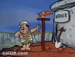 A Cartoon Character Is Standing In Front Of An Office GIF