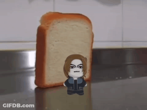 A Cartoon Character Is Standing Next To A Piece Of Bread GIF