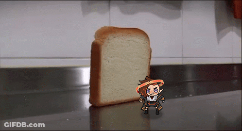 A Cartoon Character Is Standing Next To A Slice Of Bread On A Counter GIF