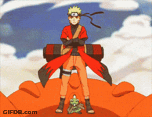 A Cartoon Character Is Standing On A Giant Orange Object GIF