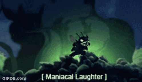 A Cartoon Character Is Standing On Top Of A Pile Of Rocks With The Words Maniacal Laughter Written On The Bottom GIF
