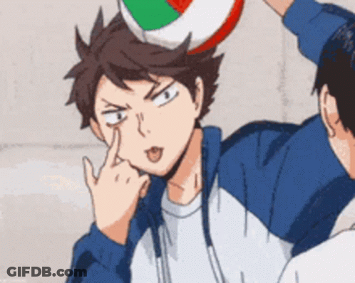 A Cartoon Character Is Sticking His Tongue Out While Holding A Volleyball On His Head . GIF
