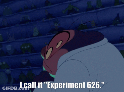 A Cartoon Character Is Under A Glass Dome In Front Of A Crowd Of People GIF