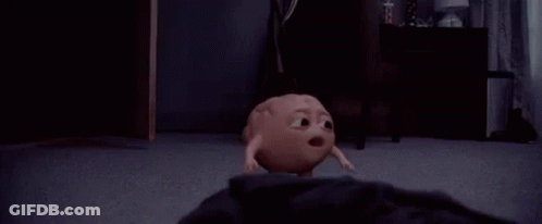 A Cartoon Character Is Walking On A Carpeted Floor In A Room . GIF