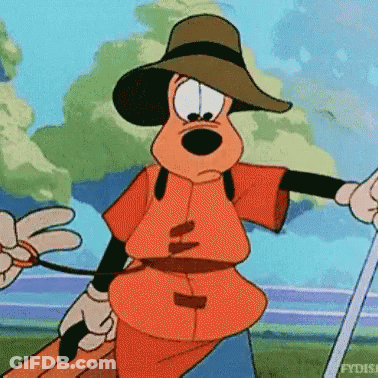 A Cartoon Character Is Wearing A Hat And Holding A Suitcase . GIF