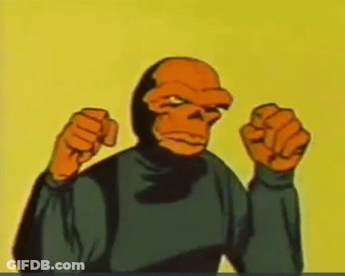 A Cartoon Character Is Wearing A Mask And Raising His Fists In The Air GIF