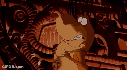 A Cartoon Character Is Wearing A Necklace With A Lion On It GIF