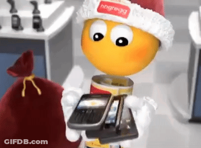 A Cartoon Character Is Wearing A Santa Hat And Holding Two Phones GIF