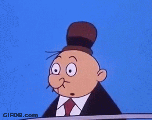 A Cartoon Character Is Wearing A Suit And Tie And Has Two Faces . GIF