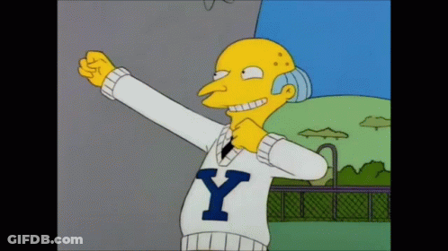 A Cartoon Character Is Wearing A White Sweater With The Letter Y On It GIF