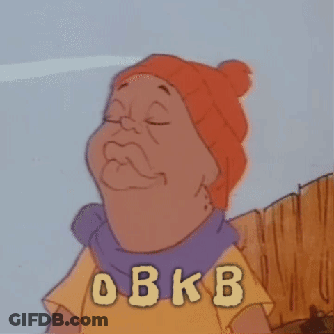 A Cartoon Character Is Wearing An Orange Hat And A Purple Scarf With The Letters O B K B On His Shirt GIF