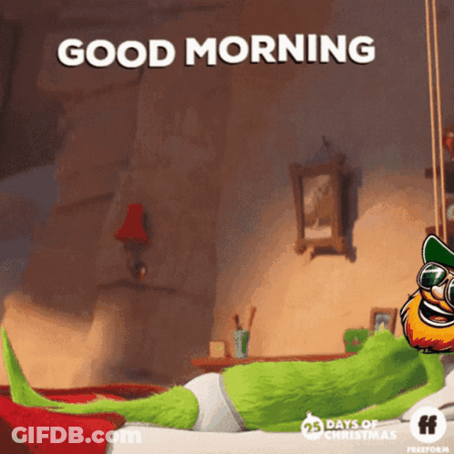 A Cartoon Character Laying On A Bed With The Words " Good Morning " GIF