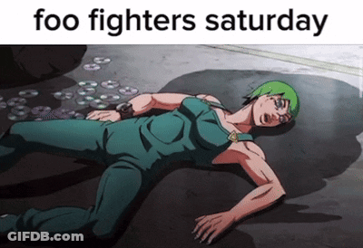 A Cartoon Character Laying On The Ground With The Words " Foo Fighters Saturday " GIF