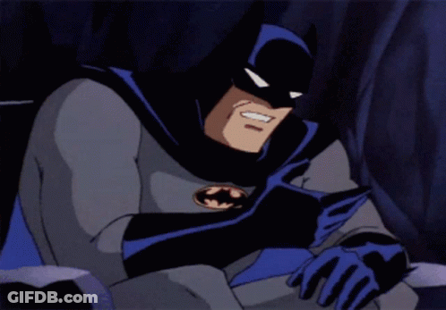 A Cartoon Character Named Batman Is Sitting Down With His Head Resting On His Arm GIF