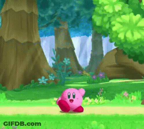 A Cartoon Character Named Kirby Is Standing On A Path In A Forest GIF