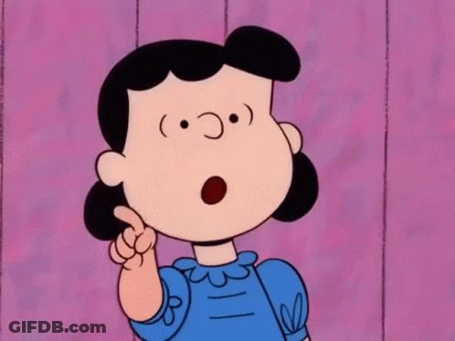 A Cartoon Character Named Lucy Is Pointing Her Finger Up GIF