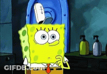 A Cartoon Character Named Spongebob Is Holding A Soap Dispenser GIF