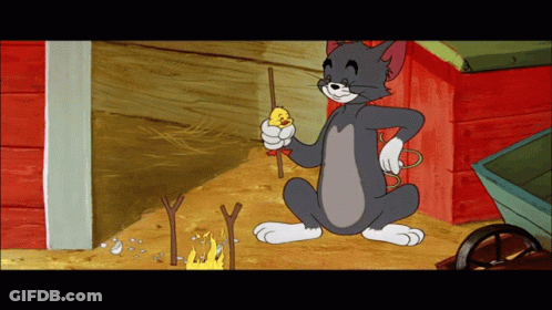 A Cartoon Character Named Tom Is Holding A Stick With A Chicken On It GIF