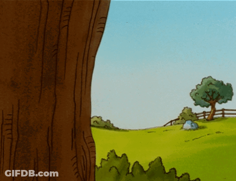A Cartoon Character Peeking Out From Behind A Tree Trunk GIF