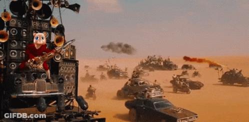 A Cartoon Character Playing A Saxophone In A Desert Scene GIF