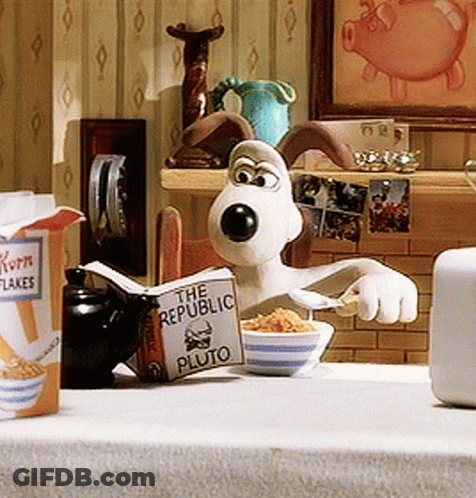 A Cartoon Character Reading A Book Called The Republic Pluto GIF