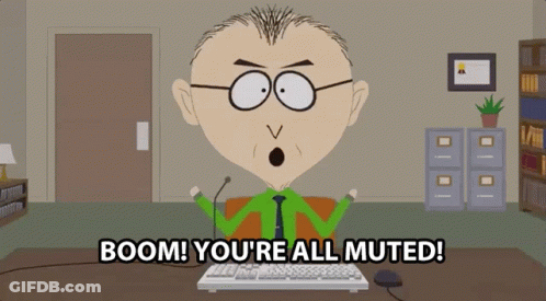 A Cartoon Character Says Boom You 'Re All Muted While Sitting At A Desk GIF