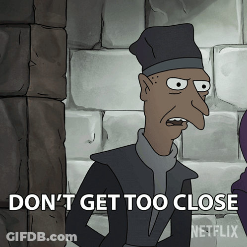 A Cartoon Character Says " Do N't Get Too Close " In Front Of A Brick Wall GIF