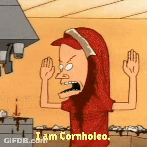 A Cartoon Character Says " I Am Cornhole " While Wearing A Red Shirt GIF