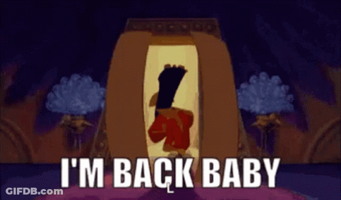 A Cartoon Character Says I 'M Back Baby While Standing In A Doorway GIF