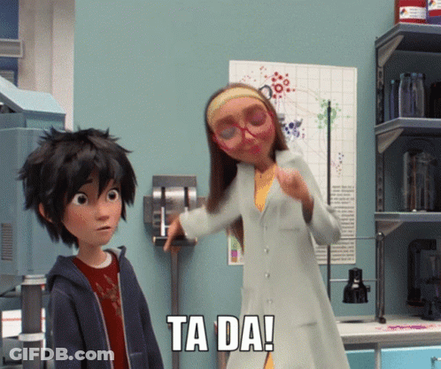 A Cartoon Character Says Ta Da In A Lab GIF