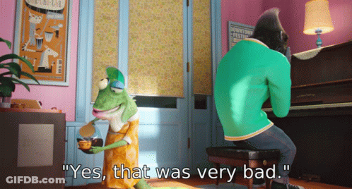 A Cartoon Character Says " Yes That Was Very Bad " While A Man Sits At A Piano GIF