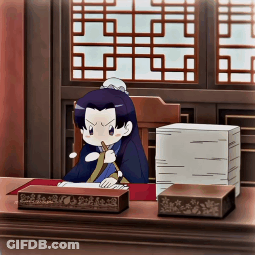 Cartoon Character Sitting At Desk With Papers GIF