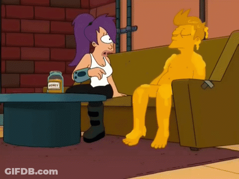 A Cartoon Character Sits On A Couch Next To A Table With A Jar Of Honey On It GIF