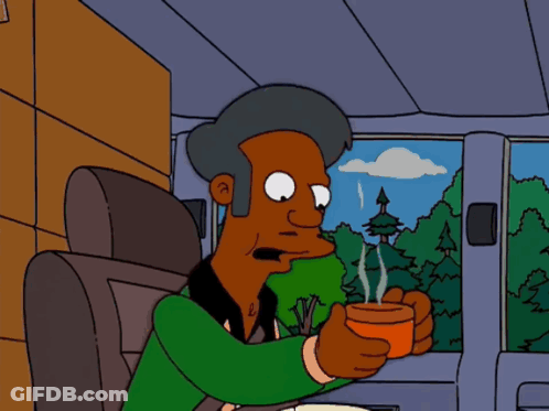 A Cartoon Character Sitting In A Car Holding A Cup GIF