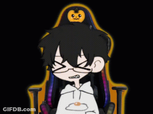 A Cartoon Character Sitting In A Chair With A Pumpkin On His Head GIF