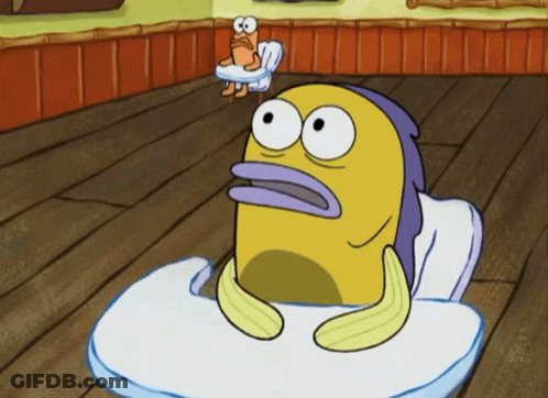 A Cartoon Character Sitting In A High Chair GIF