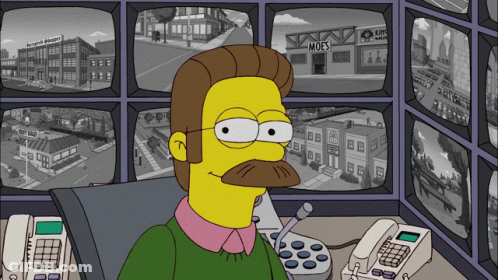 A Cartoon Character Sitting In Front Of A King Moe 'S Restaurant GIF