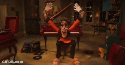 A Cartoon Character Sitting In Front Of A Piano With His Hands Outstretched GIF