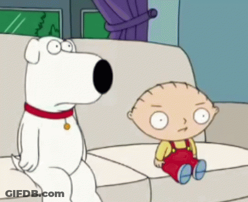 A Cartoon Character Sitting On A Couch With A Dog GIF