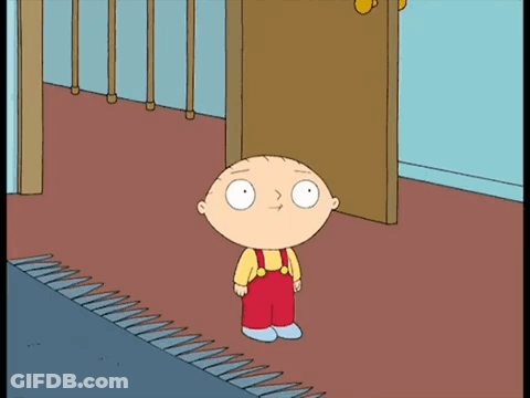 A Cartoon Character Standing In Front Of A Door Wearing Red Overalls GIF