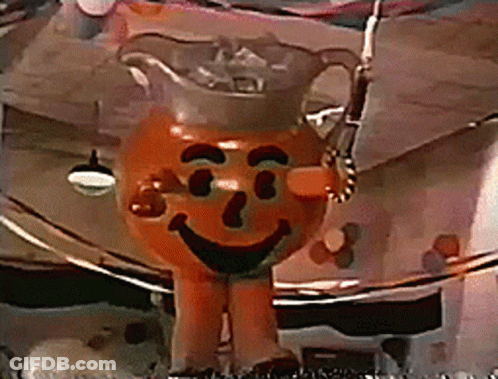 A Cartoon Character That Looks Like A Pitcher With A Face On It GIF