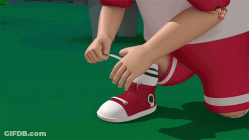 A Cartoon Character Tying A Shoe With The Number 1 And 2 Behind Him GIF