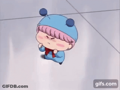 A Cartoon Character Wearing A Blue Hat And Scarf Is Standing On The Floor . GIF