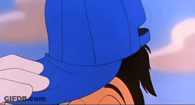 A Cartoon Character Wearing A Blue Hat With A Hand On It GIF
