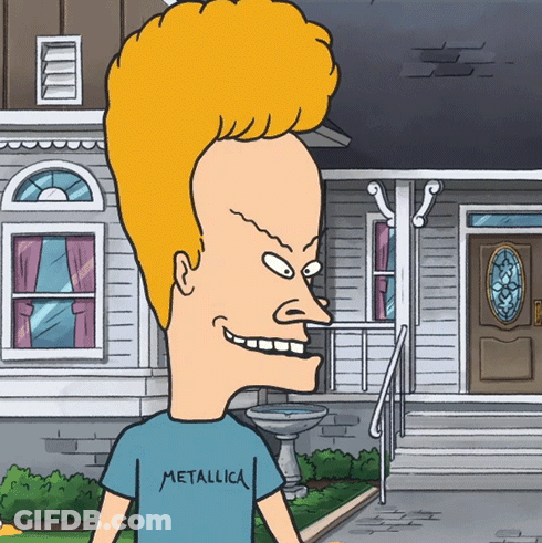 A Cartoon Character Wearing A Blue Metallica Shirt GIF
