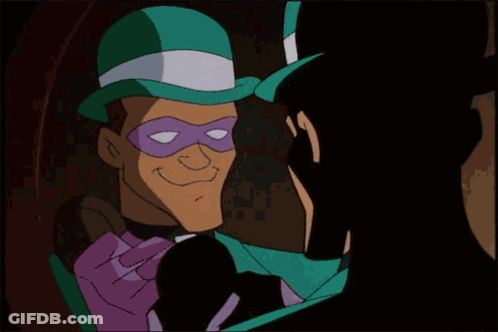 A Cartoon Character Wearing A Green Hat And A Purple Mask With The Letter C On It GIF
